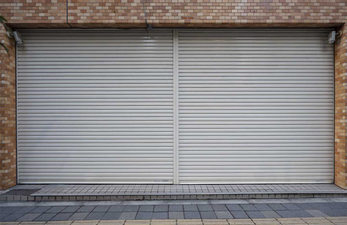 Garage door stuck in The Woodlands? Fast, affordable repair is just a call away.