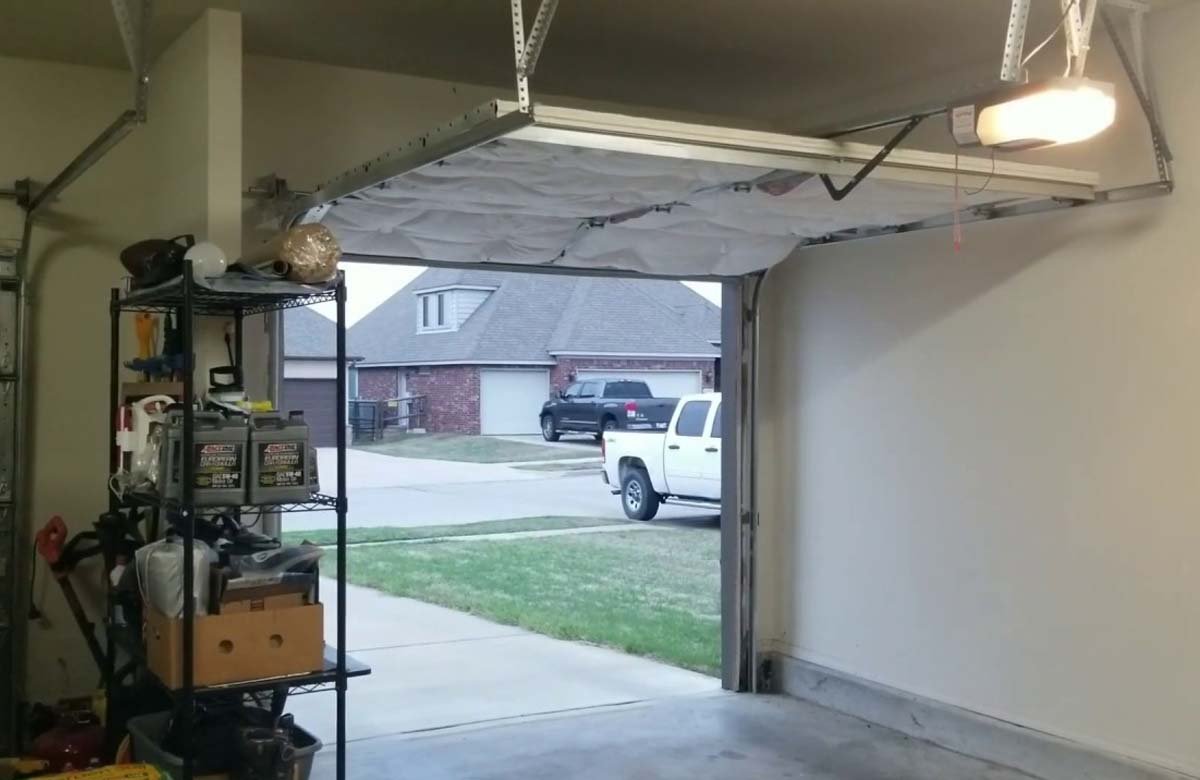Professional garage door repair for jerky movement in The Woodlands.
