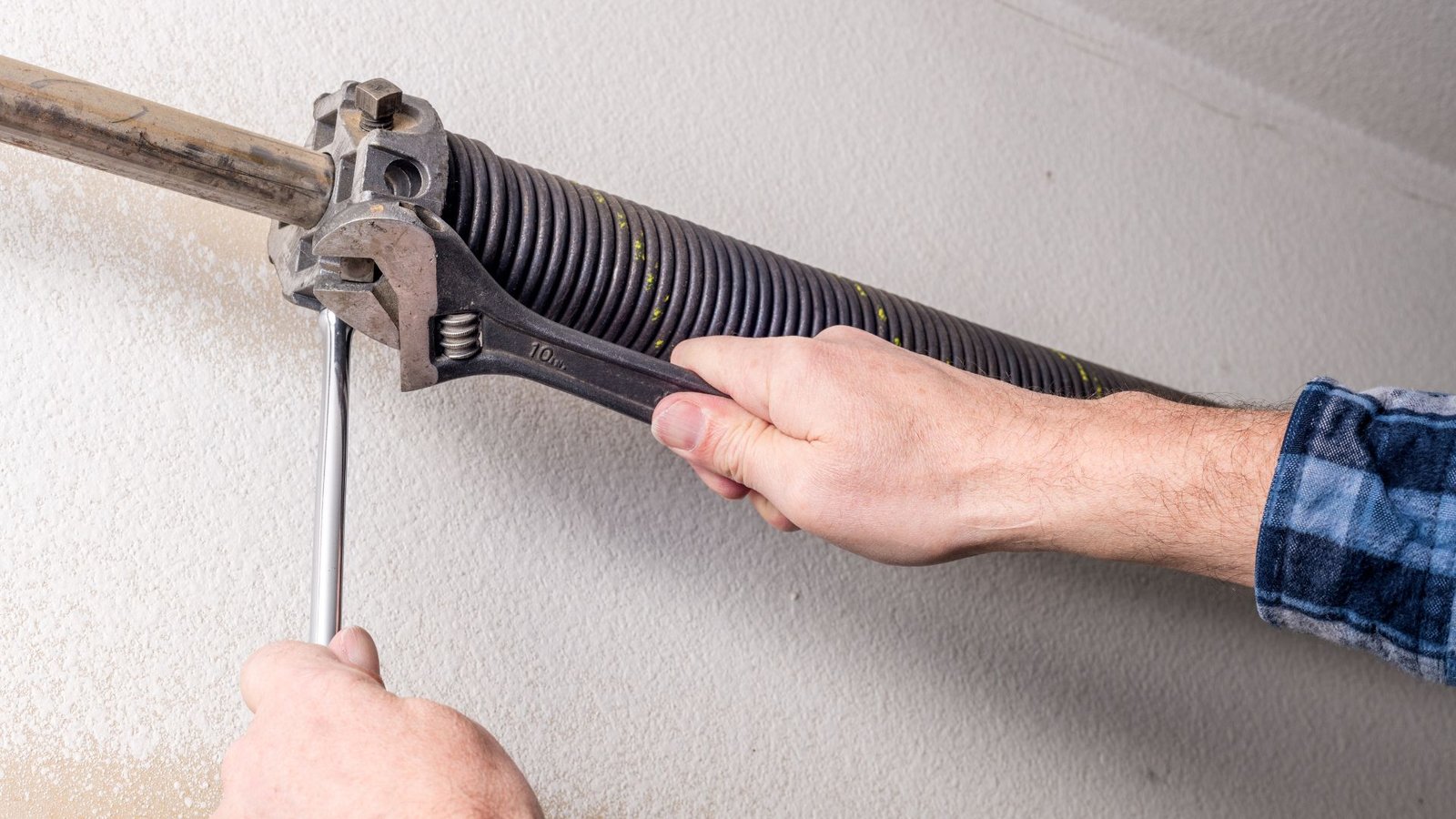 Can You Open a Garage Door With a Broken Spring? What to Do Next