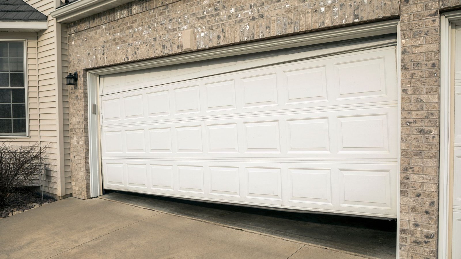 When Your Garage Door Opens a Few Inches Then Stops: Quick Fixes That Work